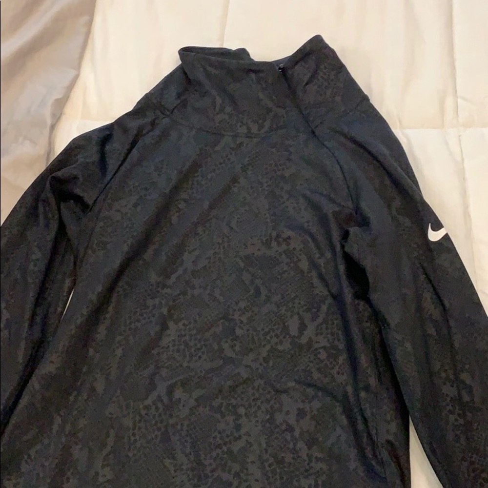 Nike fleece lined half way zip pull over